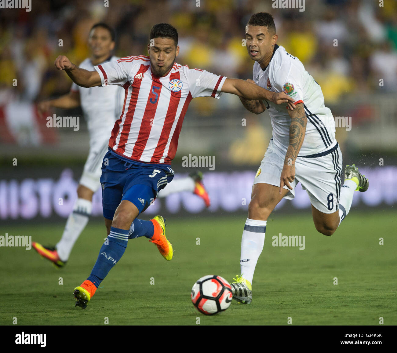 Pasadena, USA. 7th June, 2016. Paraguay's Bruno Valdez (L) vies with Colombia's Edwin Cardona during the Copa America Centenario Group A match at Rose Bowl Stadium in Pasadena, California, the United States, June 7, 2016. © Yang Lei/Xinhua/Alamy Live News Stock Photo