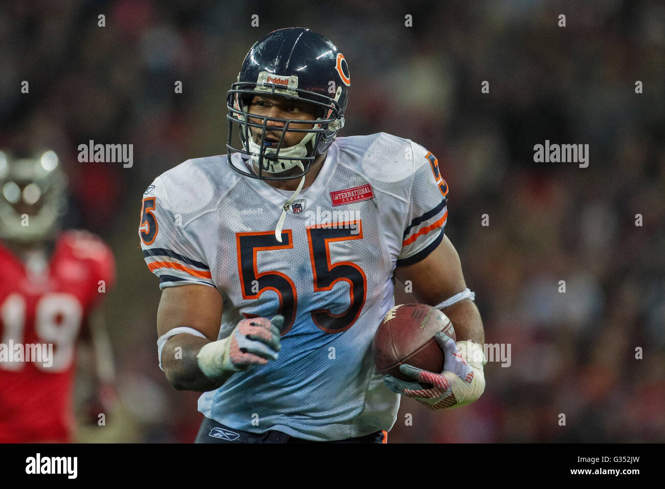 LB Lance Briggs, #55 Chicago Bears, runs with the ball during the NFL International game between the Tampa Bay Buccaneers and Stock Photo