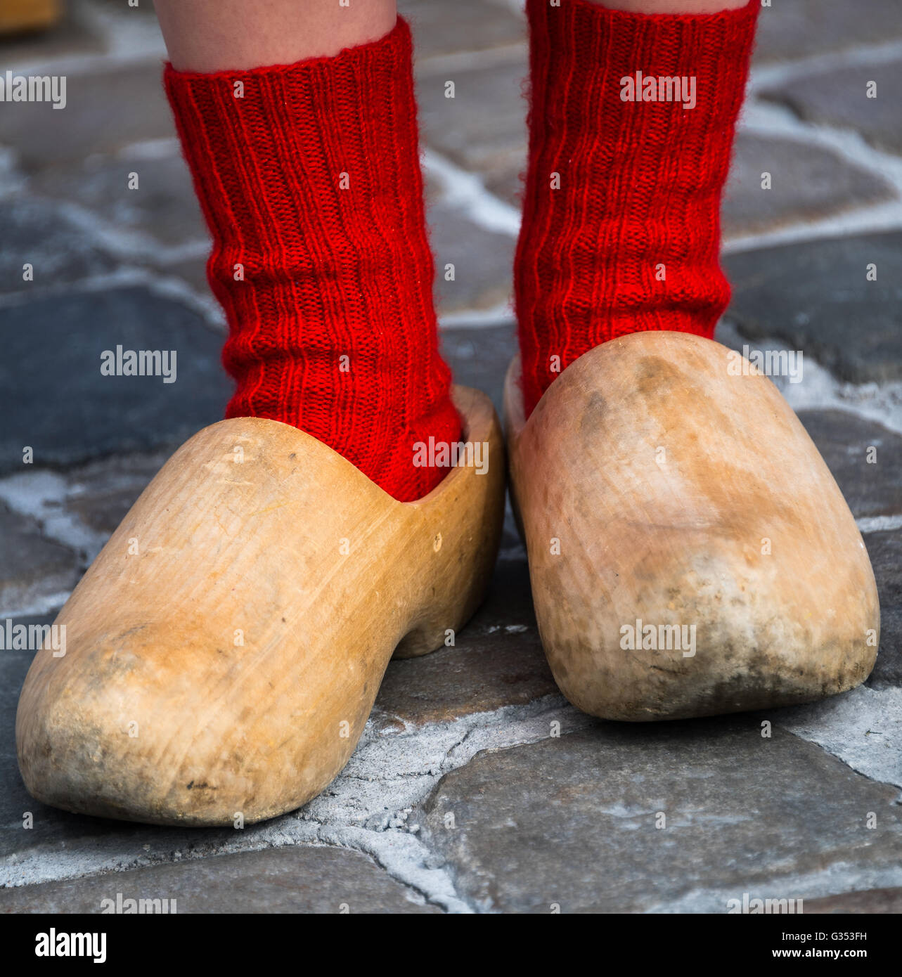 Traditional clogs and costumes in the cheese market, Gouda, Netherlands Stock Photo