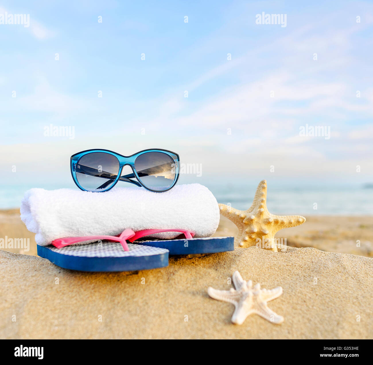 Beach towel flip flops sunglasses hi-res stock photography and images ...