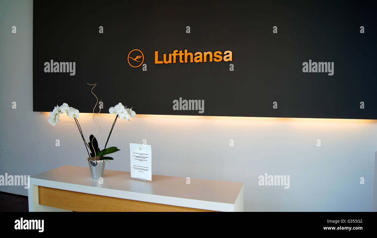 Lufthansa desk with flowers Stock Photo Alamy