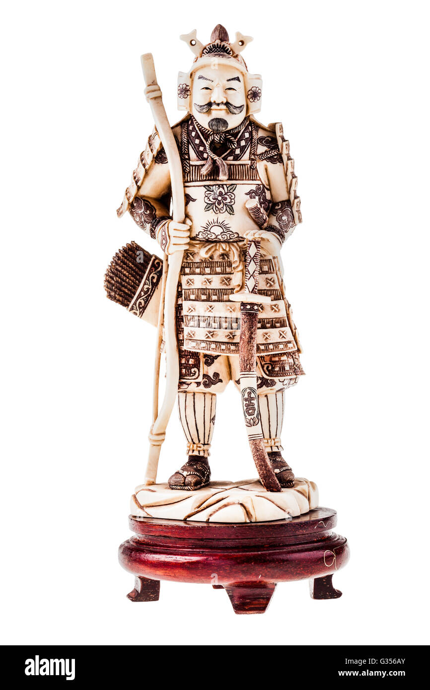 an ancient precious ivory japanese samurai warrior figurine isolated