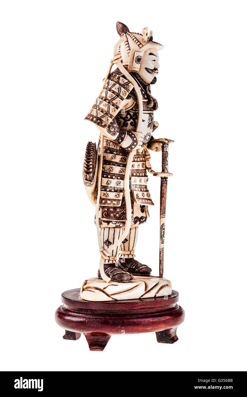 an ancient precious ivory japanese samurai warrior figurine isolated