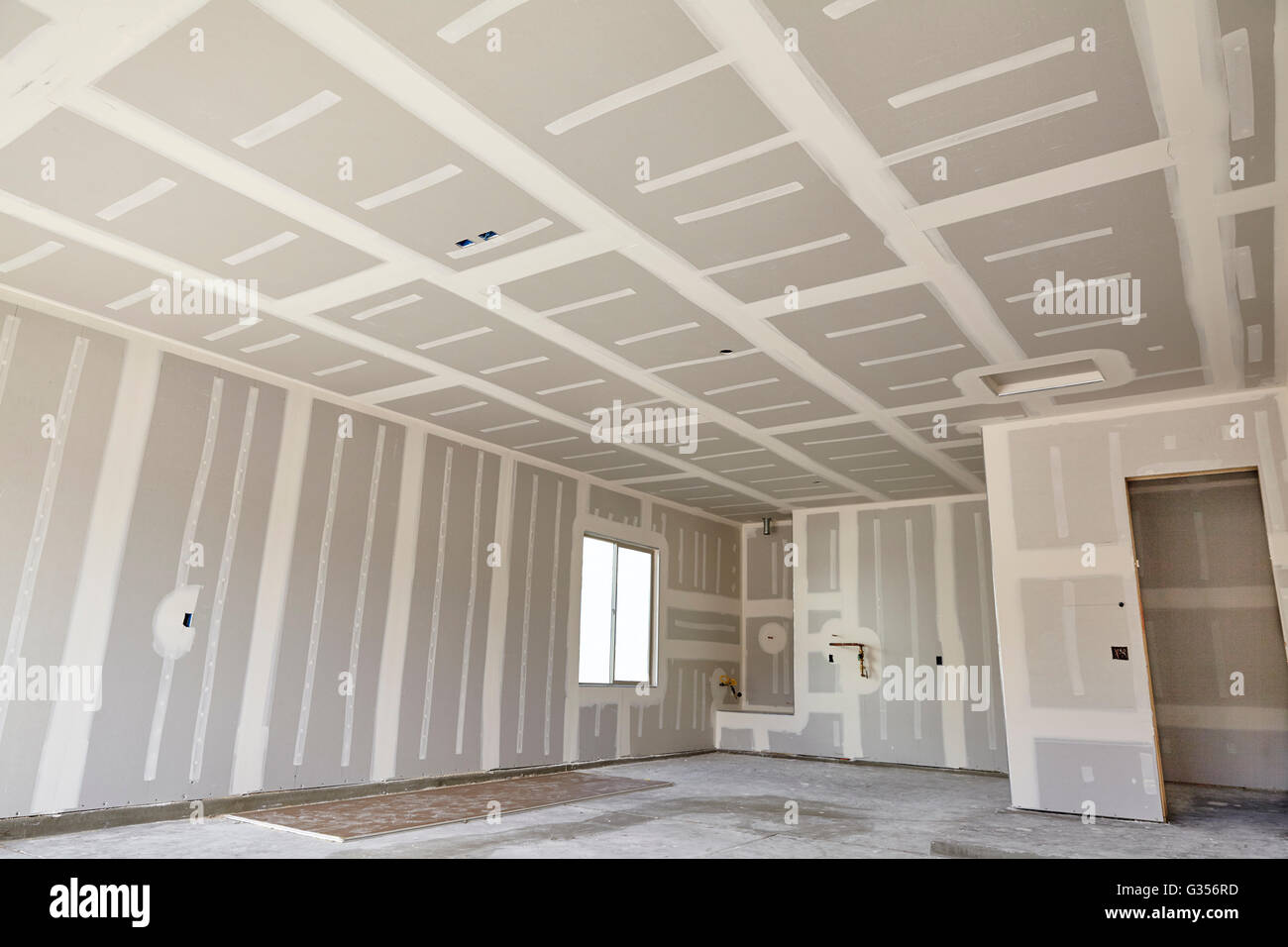 Construction building industry new home construction interior drywall tape and finish details Stock Photo