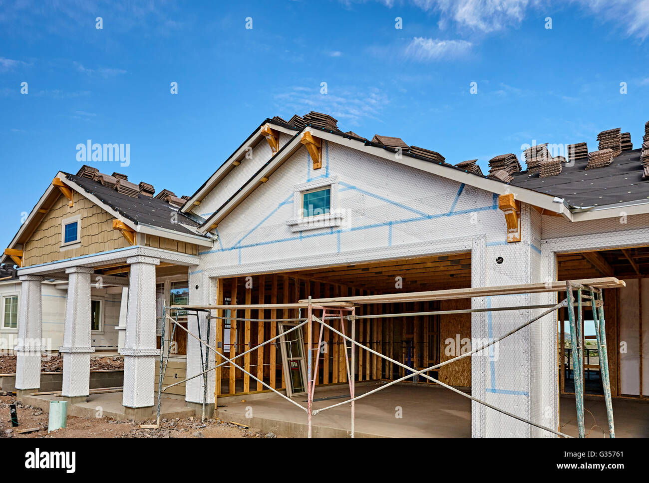 Home building industry house prep for stucco and tile roofing Stock Photo