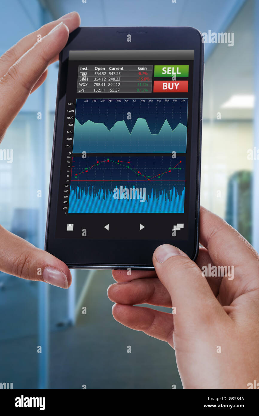 A Woman Holding A Smart Phone Running A Trading Or Forex App With - 