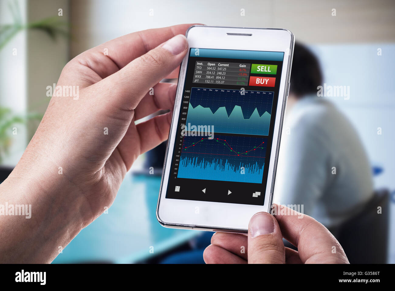 A Woman Holding A Smart Phone Running A Trading Or Forex App With - 