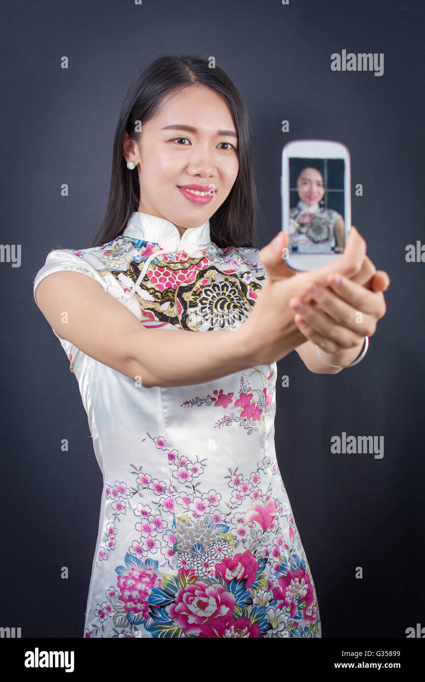 Young woman making a selfie with smart phone Stock Photo