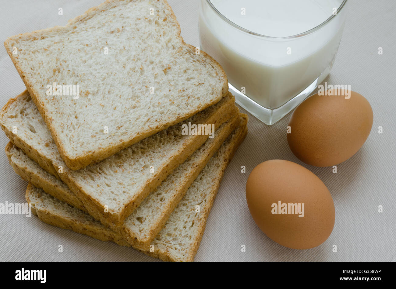 Sliced Whole Wheat Bread, Boiled Egg and Milk for Easy Breakfast Stock