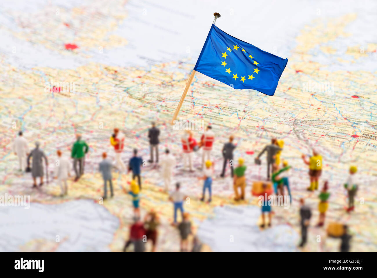 Europe map with European flag and a large group of figures. Stock Photo