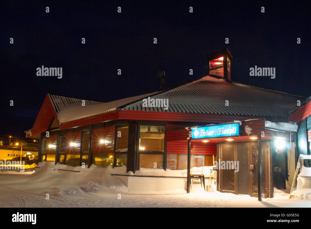 The exterior of the Polar Hotel at night, Batsfjord. Stock Photo