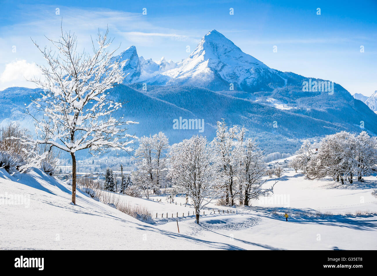 Beautiful mountain landscape in the Bavarian Alps with village of Berchtesgaden and Watzmann massif in the background at sunrise Stock Photo