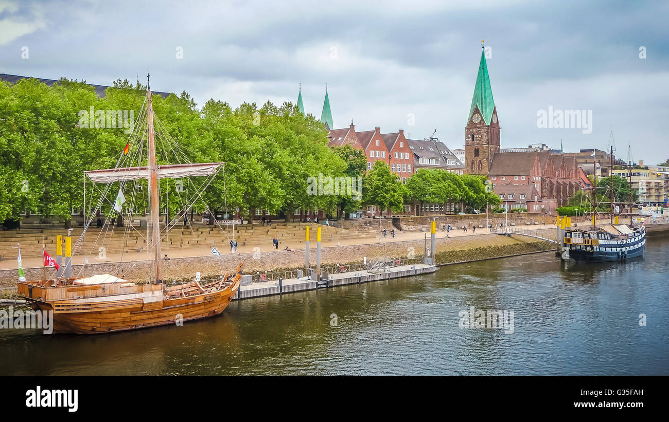 Historic town of Bremen with old sailing ship on Weser river, Germany Stock Photo