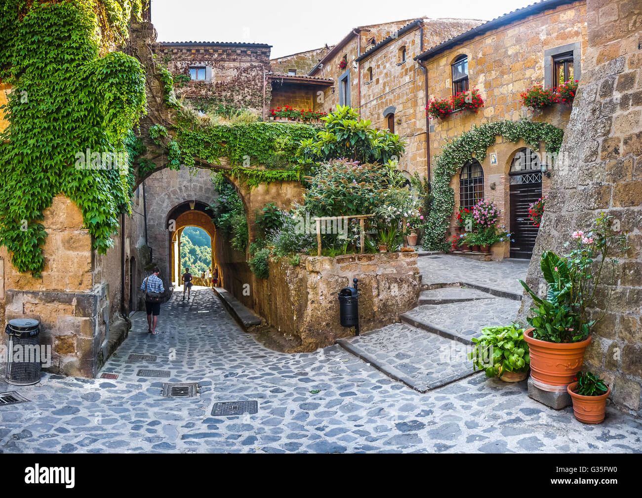 Beautiful view of idyllic alley way in famous Civita di Bagnoregio near Tiber river valley, Lazio, Italy Stock Photo