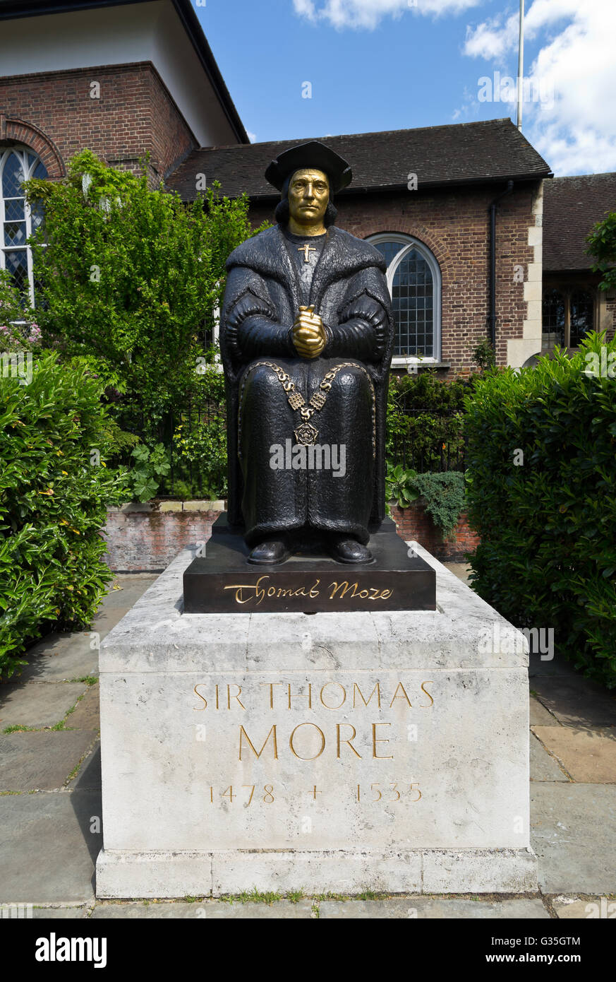 Thomas More's statue in front of the Chelsea Old Church/ All Saints, Chelsea, London, UK, Europe Stock Photo