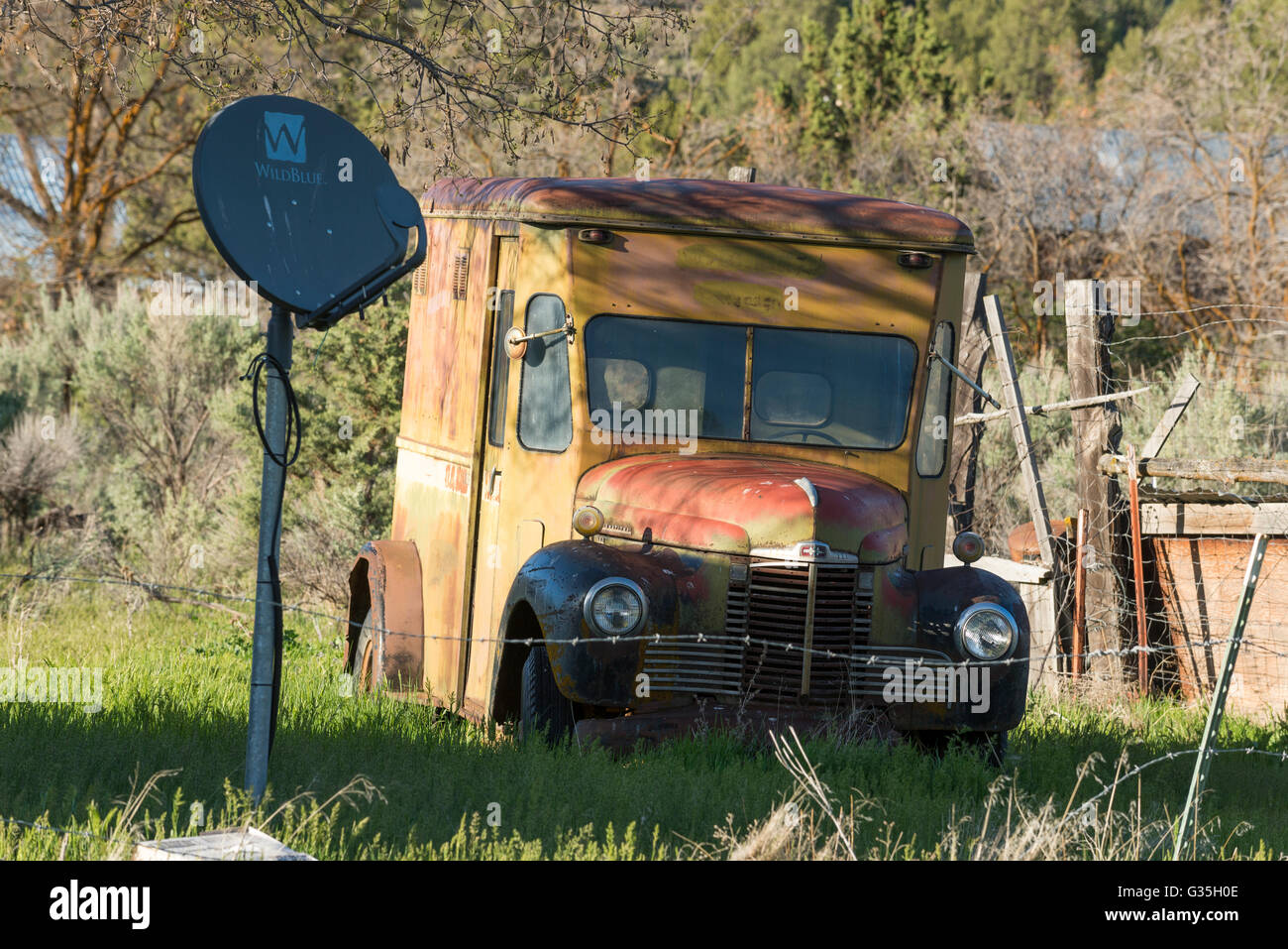 Old delivery truck and satalite dish, Fichmond, Oregon. Stock Photo