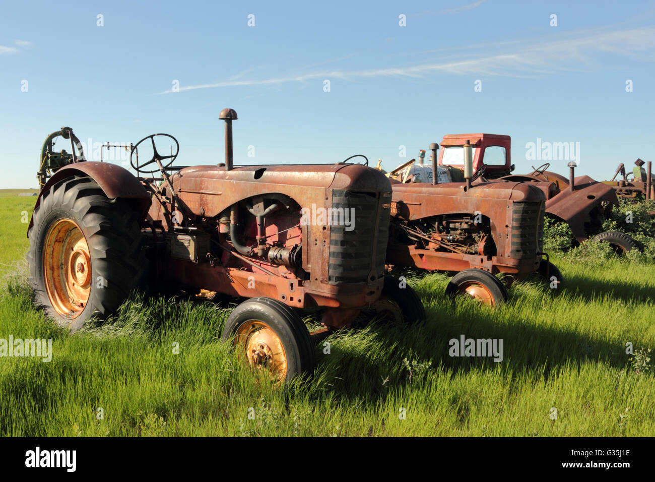 Antique Massey Harris tractors on a farm in Alberta, Canada. Stock Photo