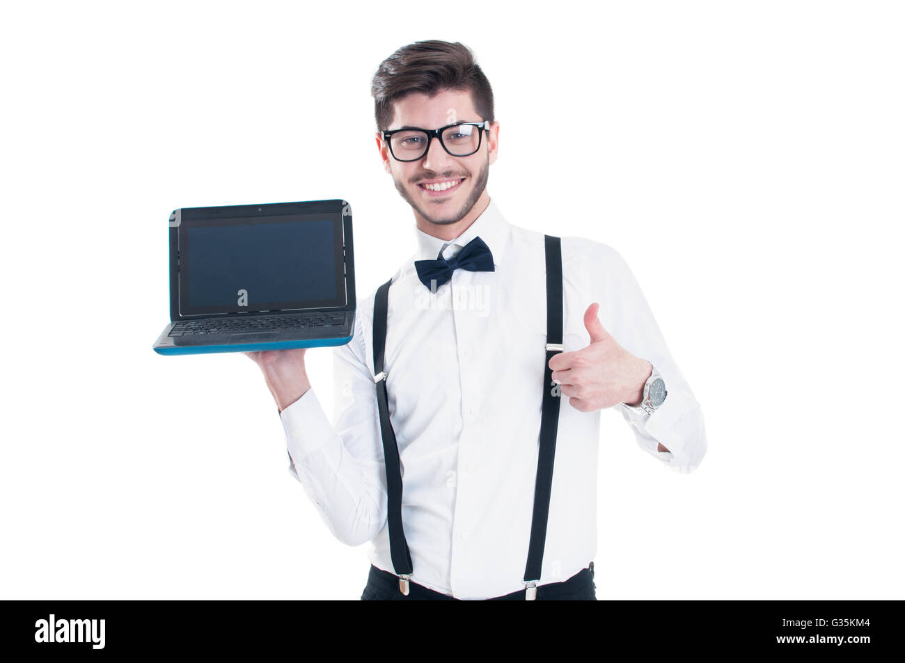 Young beautiful man holding laptop with blank screen and making the ok ...