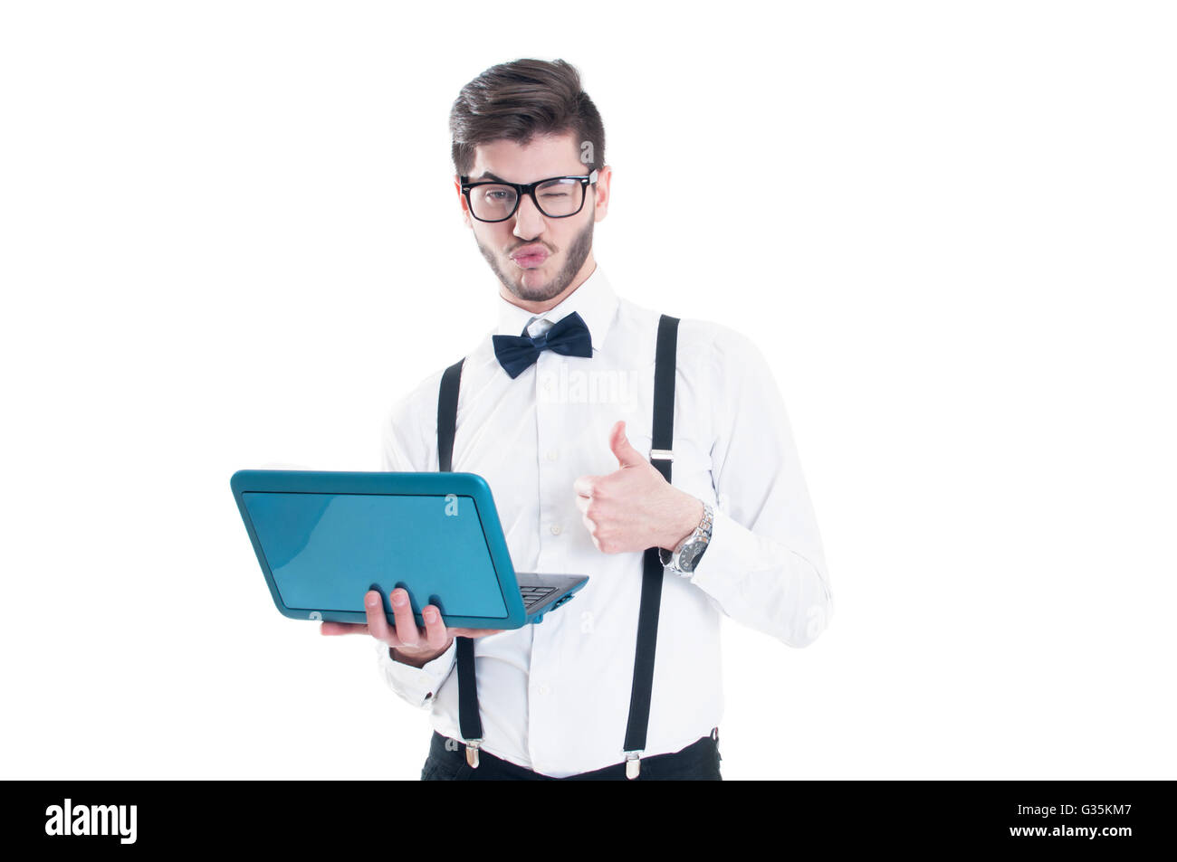 Businessman holding laptop and making the ok gesture. Isolated on white ...