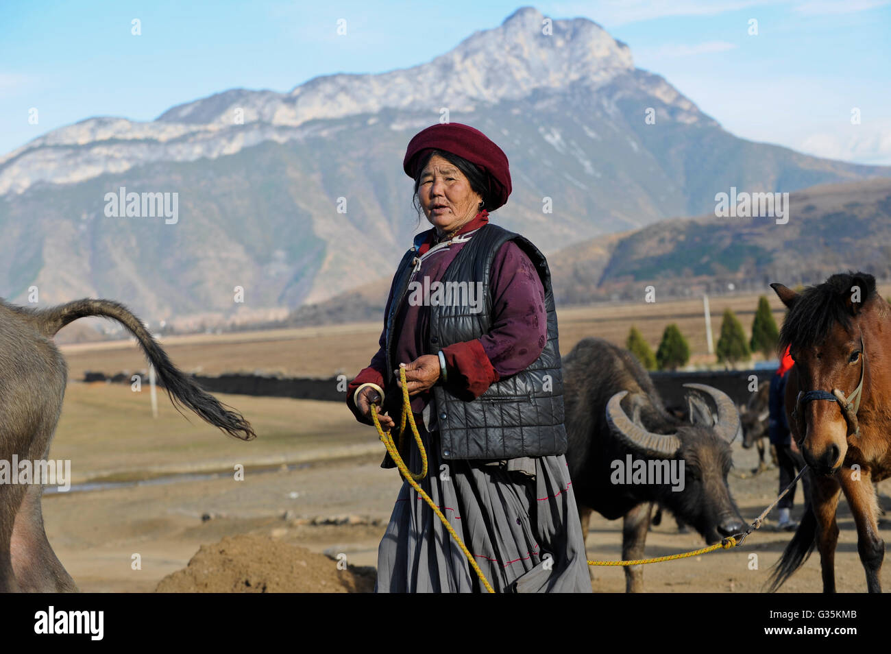 CHINA Yunnan Lugu Lake , ethnic minority Mosuo who are buddhist and women have a matriarch, matriarchal society Stock Photo