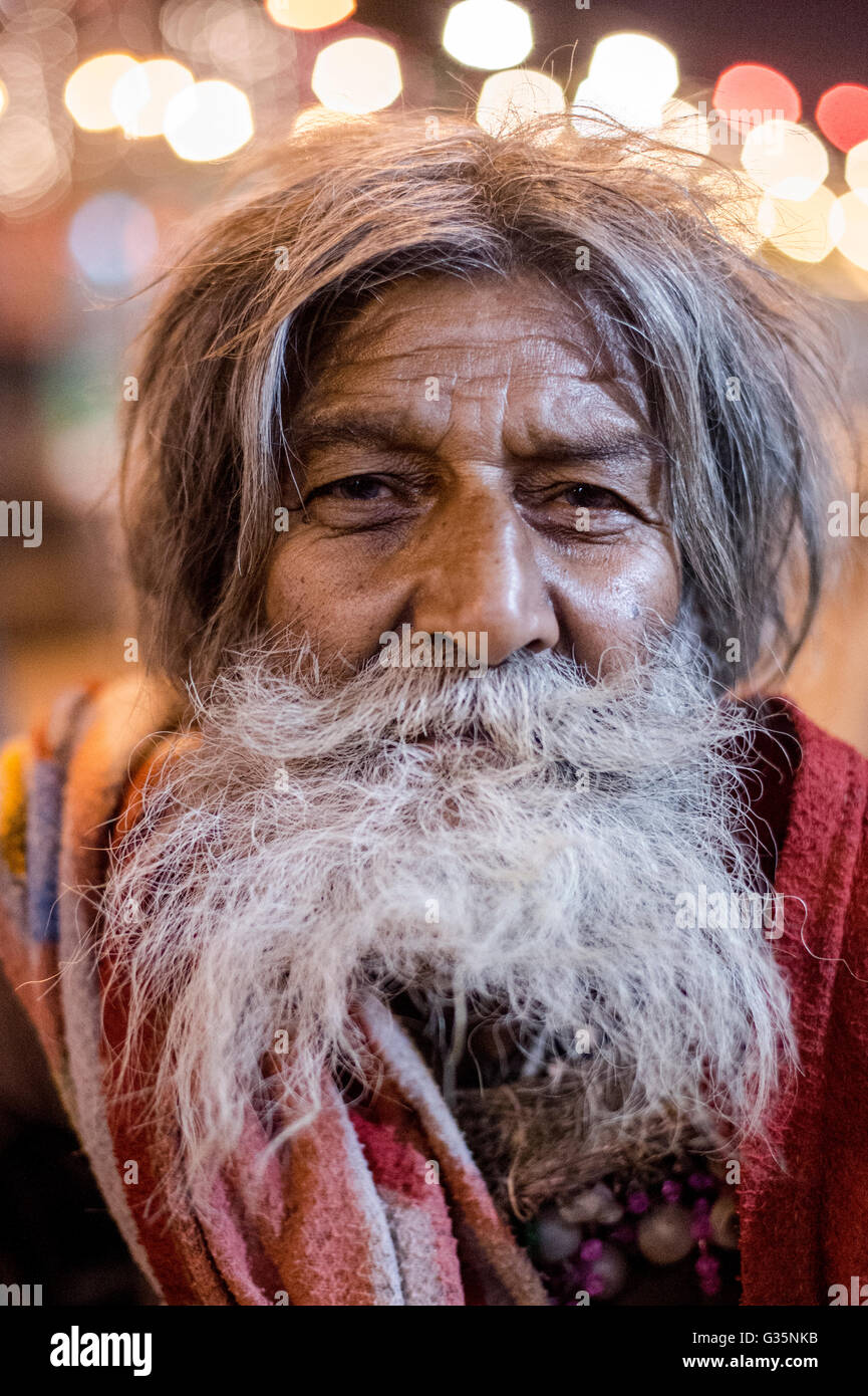 An Indian man with a beard and long hair poses for portrait in Delhi,  India. Credit: Euan Cherry Stock Photo - Alamy