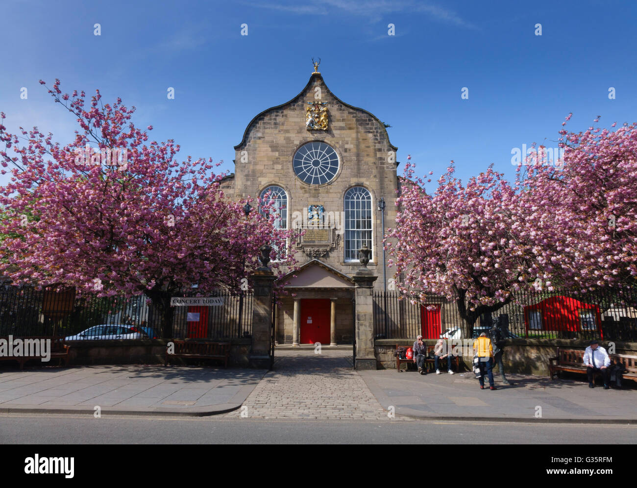 Moodie Kirk, Canongate, Edinburgh - concert venue. Cherry trees in spring. Stock Photo