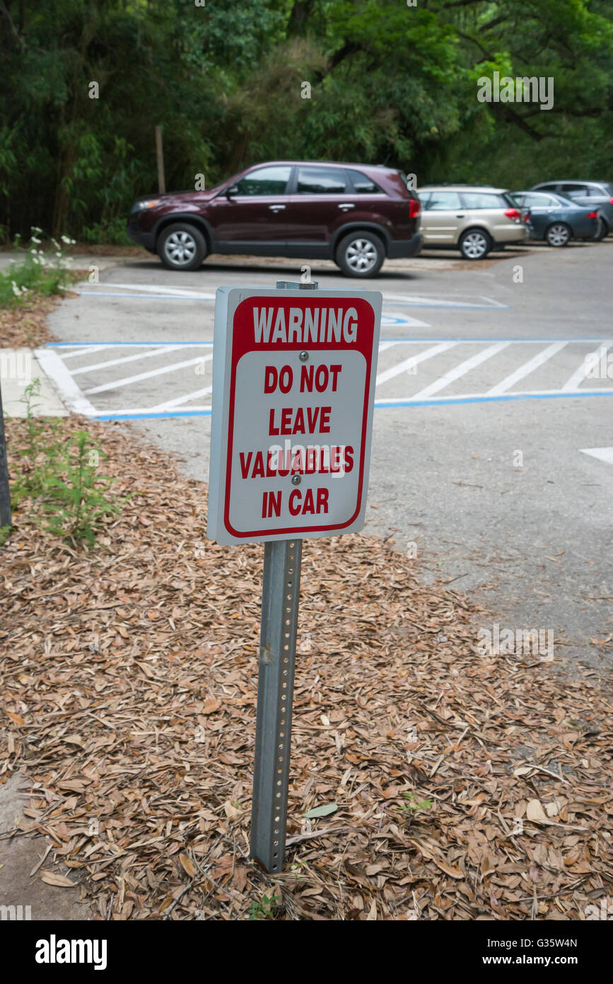 Parking lot warning sign about not leaving valuables in your car Stock  Photo - Alamy