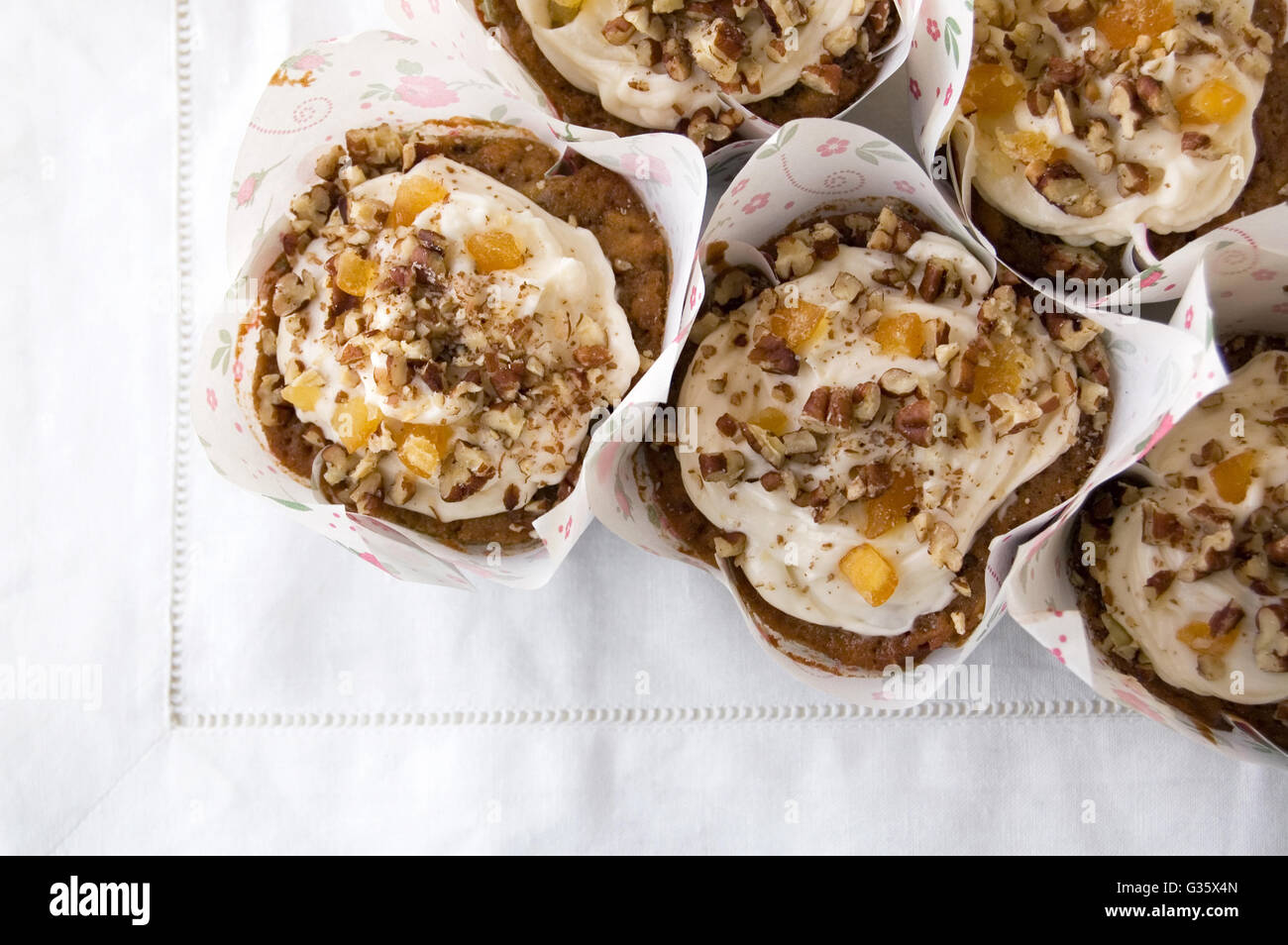 Delicious muffins with candied orange and nuts Stock Photo