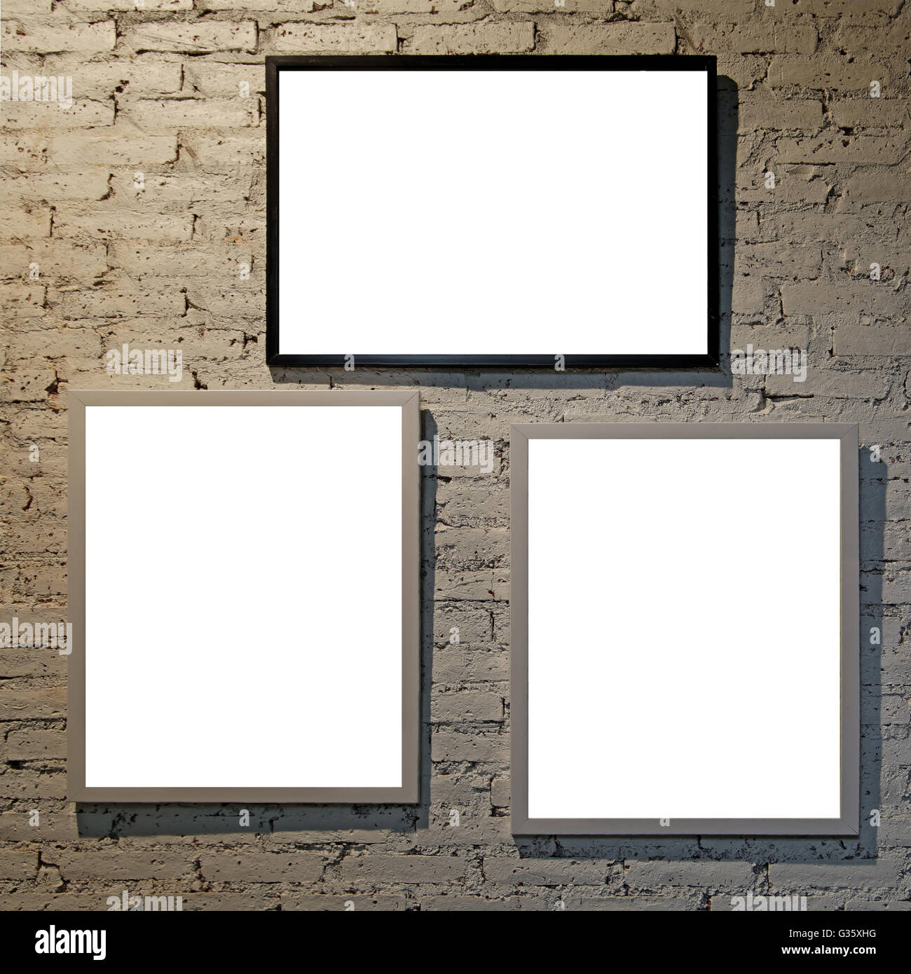 empty modern picture frames on brick wall Stock Photo Alamy