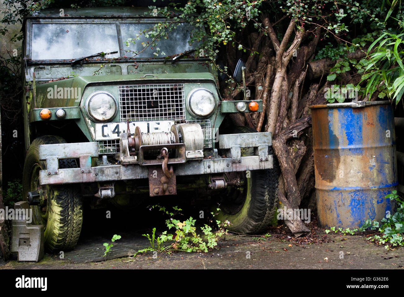 An old abadoned green Land Rover Stock Photo