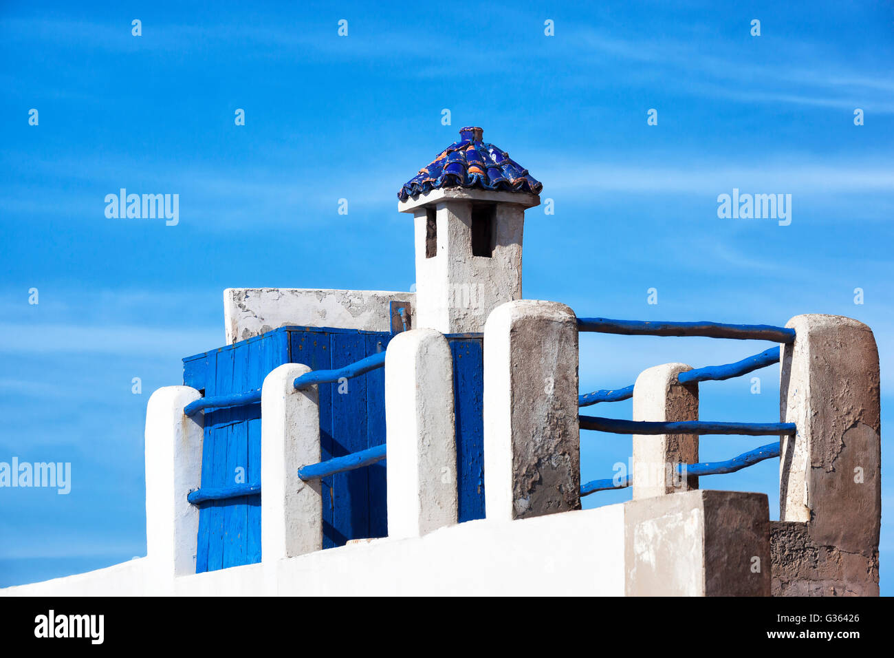 Blue and white rooftop of a house in Essaouira. Stock Photo