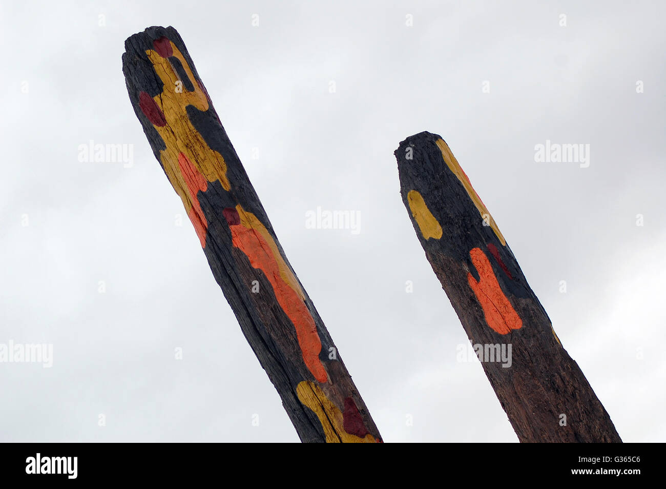 Painted wooden poles Stock Photo