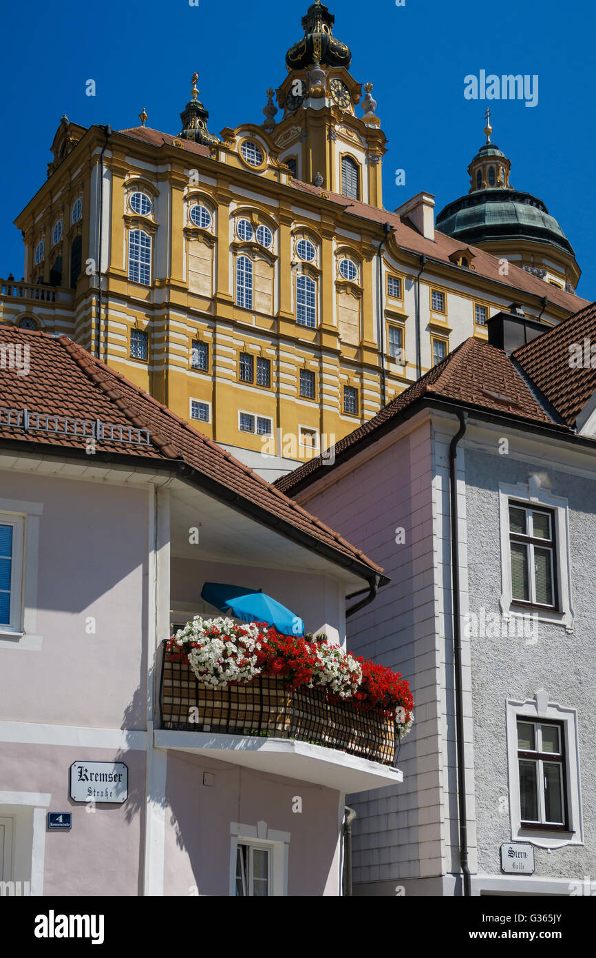 Melk Abbey appearing over the rooftops of the town, Lower Austria, Austria. Stock Photo