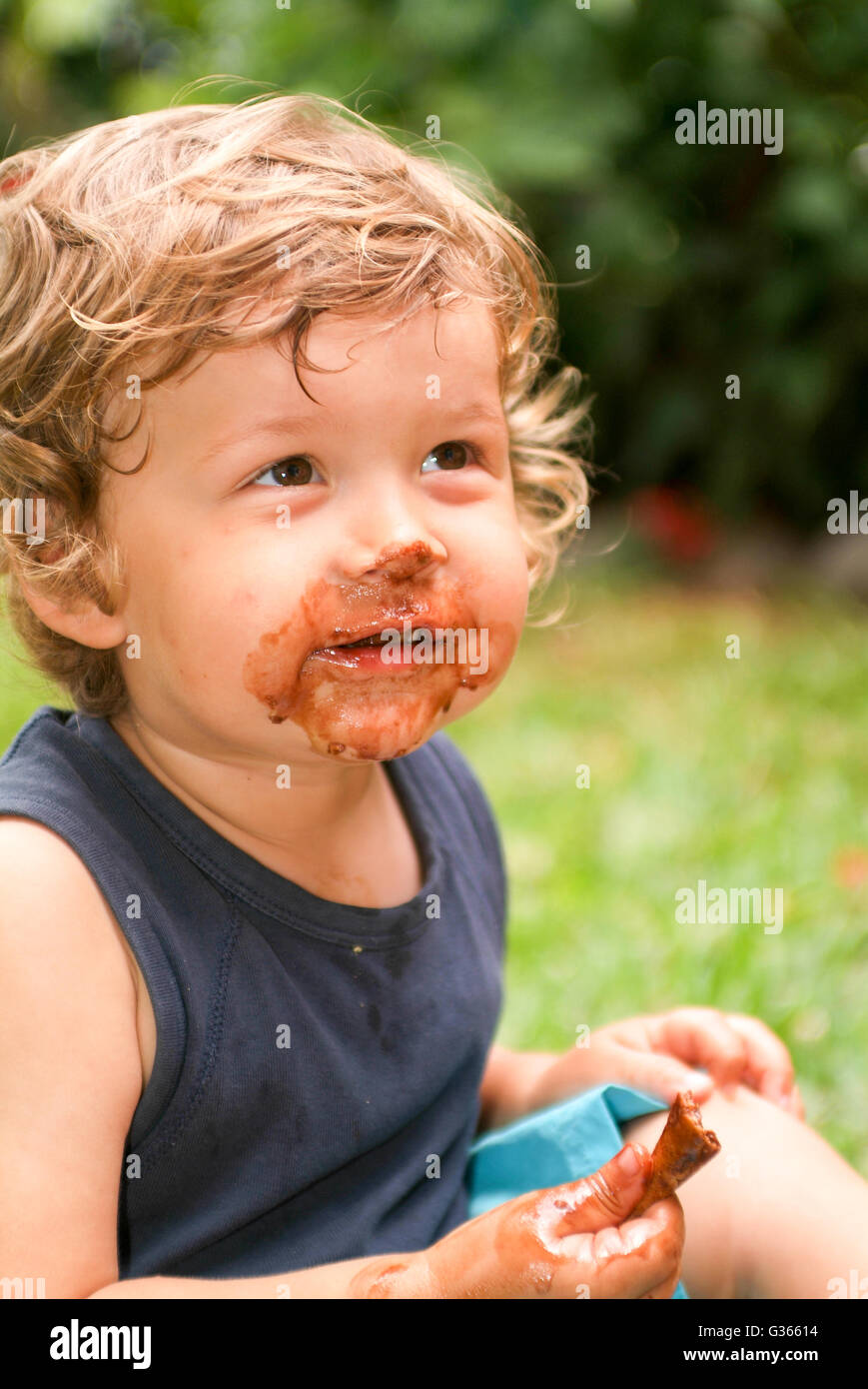 Nine month old baby male eating an ice cream Stock Photo Alamy