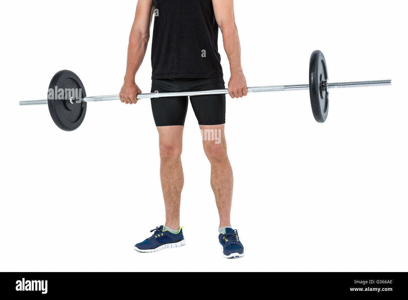 Bodybuilder lifting heavy barbell weights Stock Photo