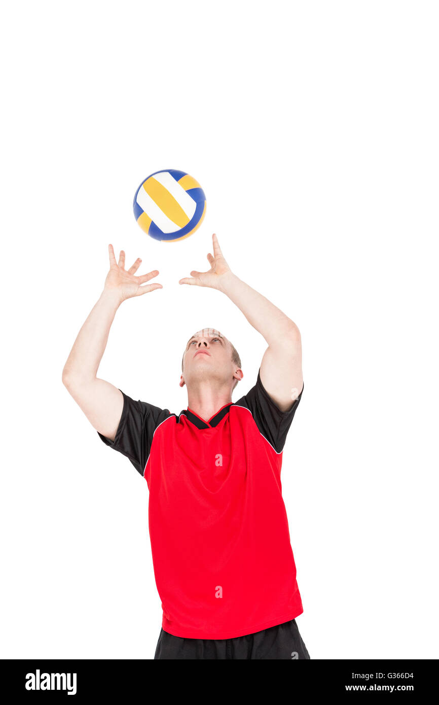 Sportsman playing a volleyball Stock Photo Alamy