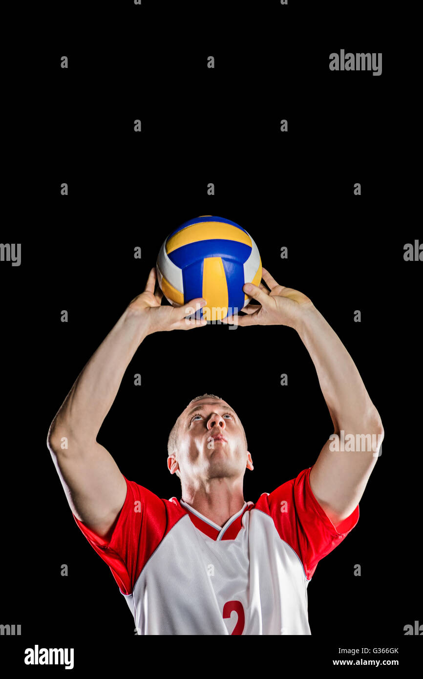 Sportsman throwing volleyball while playing Stock Photo Alamy