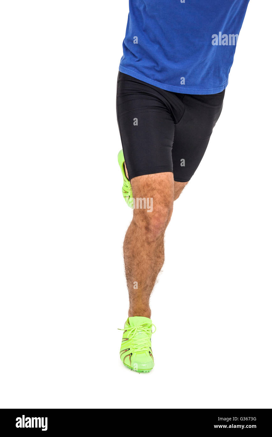 Male athlete running on white background Stock Photo