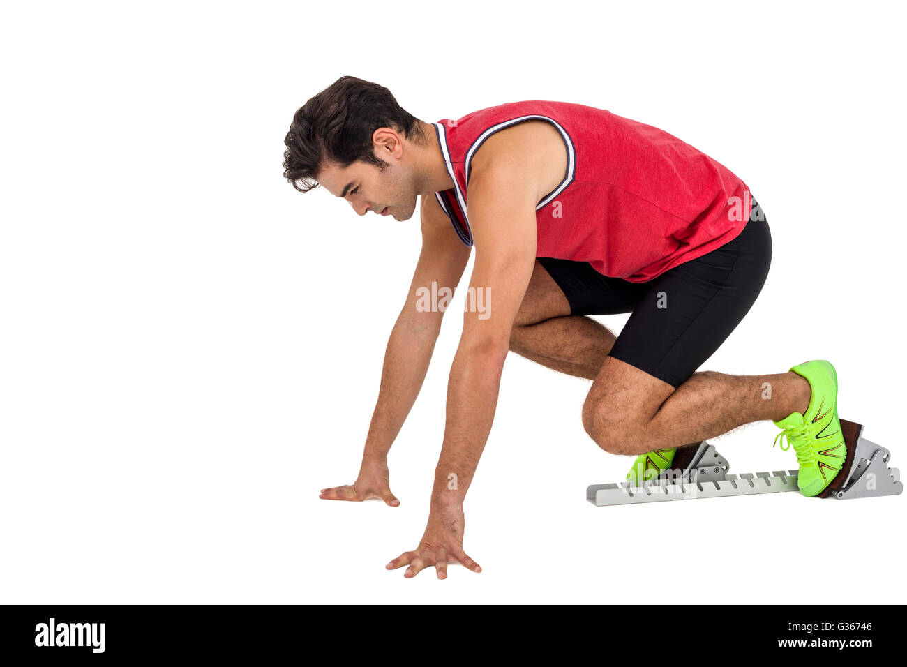 Male athlete in ready to run position Stock Photo