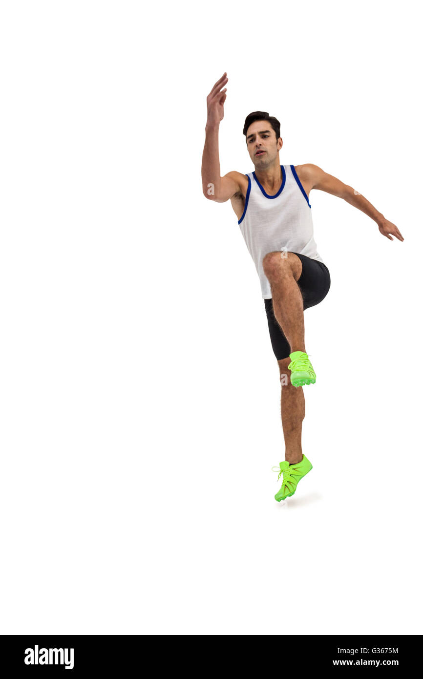 Male athlete running on white background Stock Photo