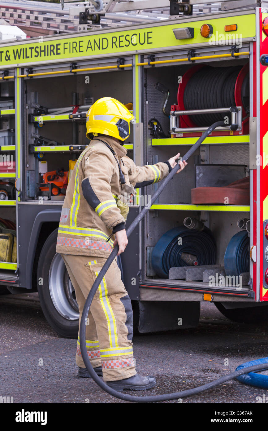 Dorset & Wiltshire Fire and Rescue firemen at scene of fire at