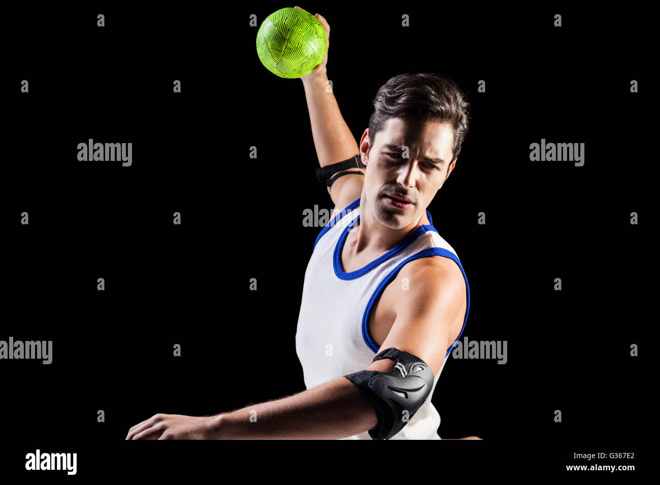 Confident athlete man throwing a ball Stock Photo Alamy