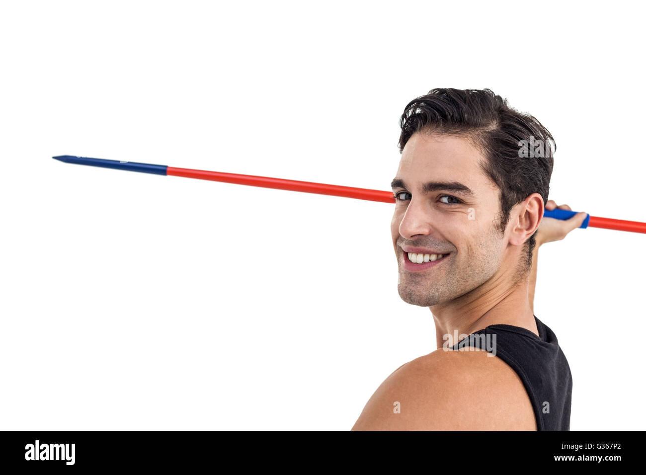 Portrait of happy male athlete holding javelin Stock Photo Alamy