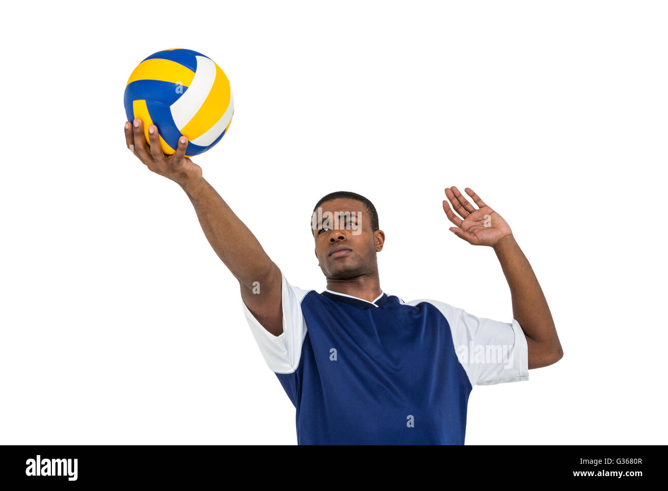 Sportsman playing a volleyball Stock Photo