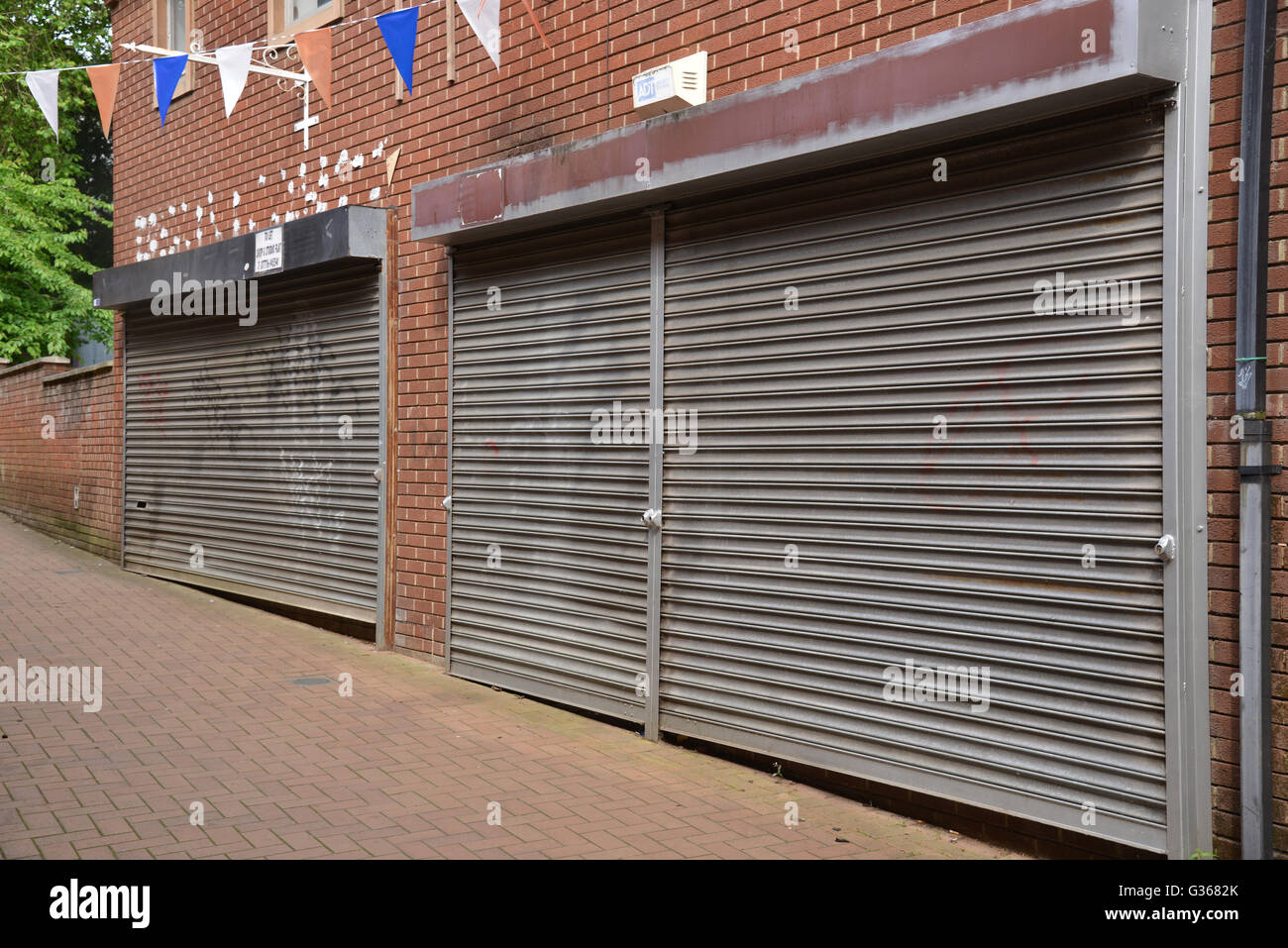 Empty shops with shuttered frontages, Banbury, Oxfordshire Stock Photo