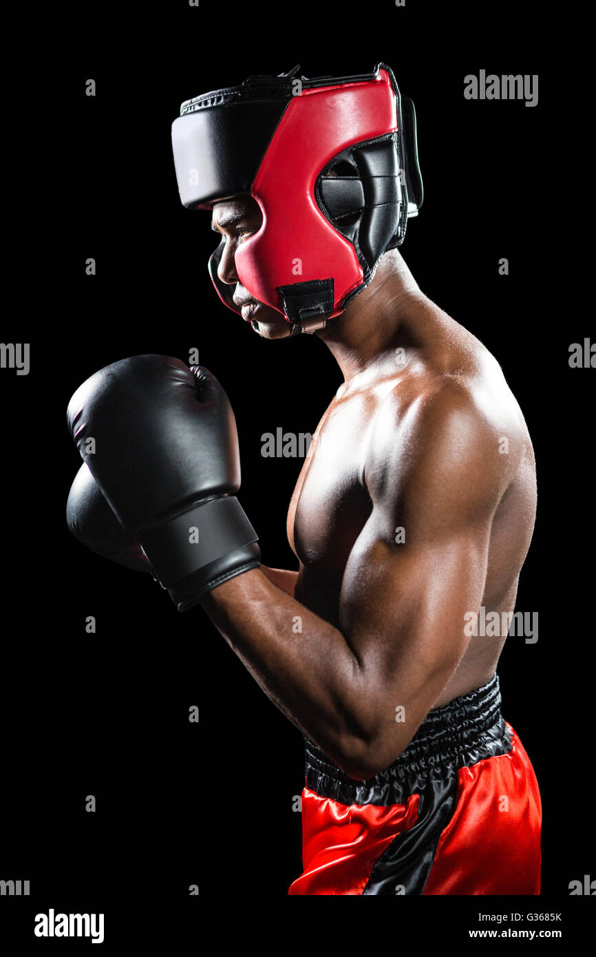 Boxer performing boxing stance Stock Photo Alamy