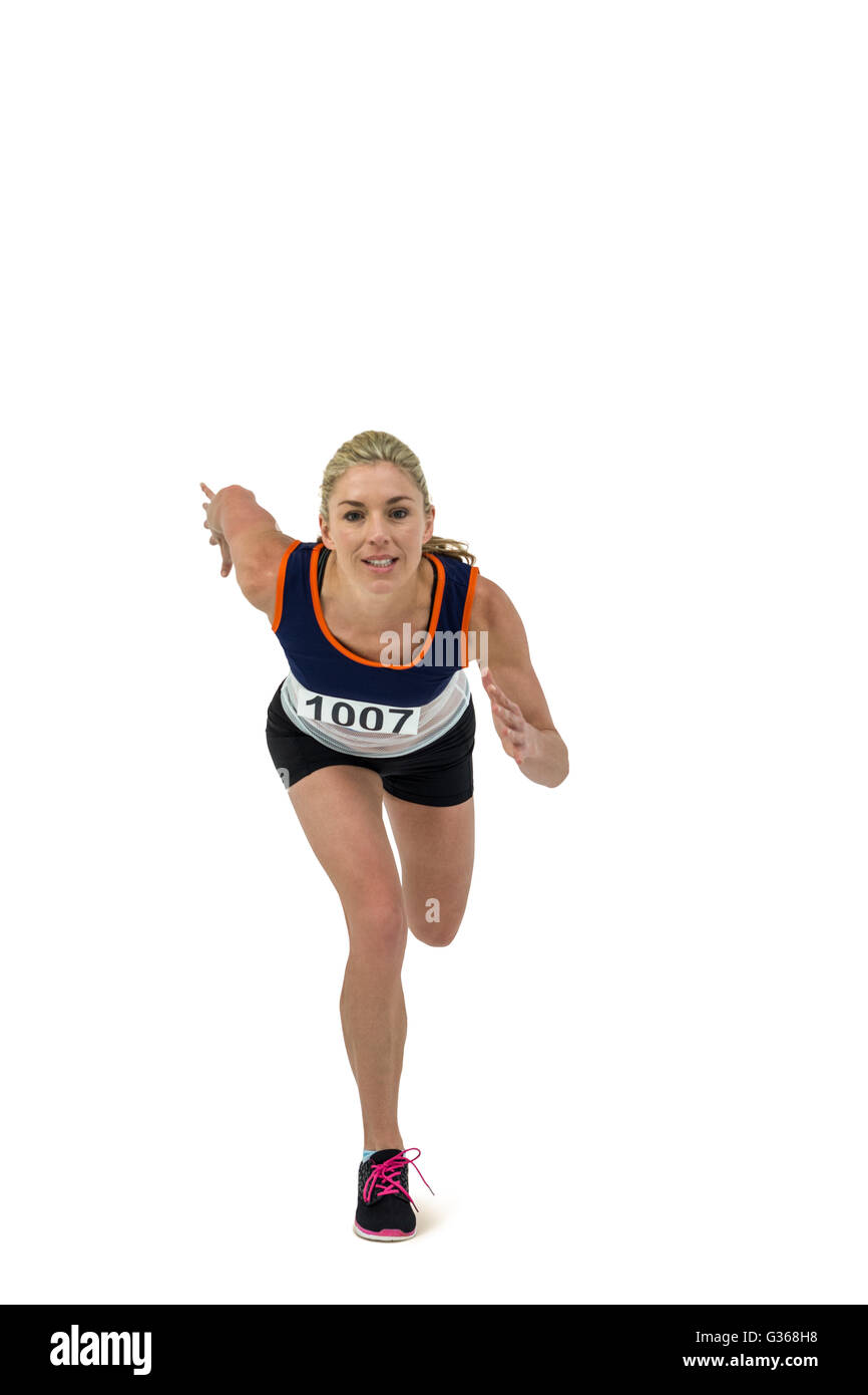 Female athlete running on white background Stock Photo
