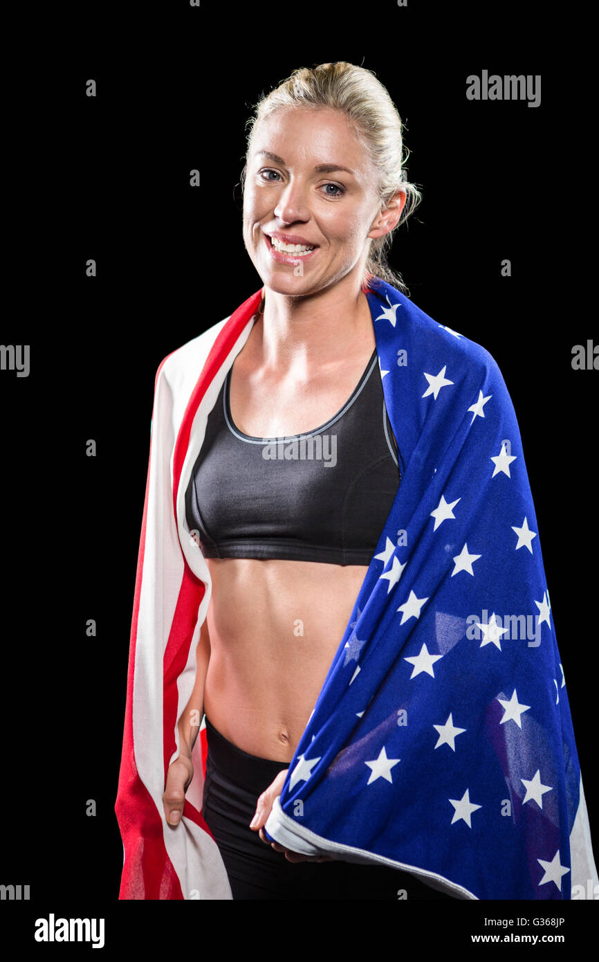 Athlete with american flag wrapped around his body Stock Photo - Alamy