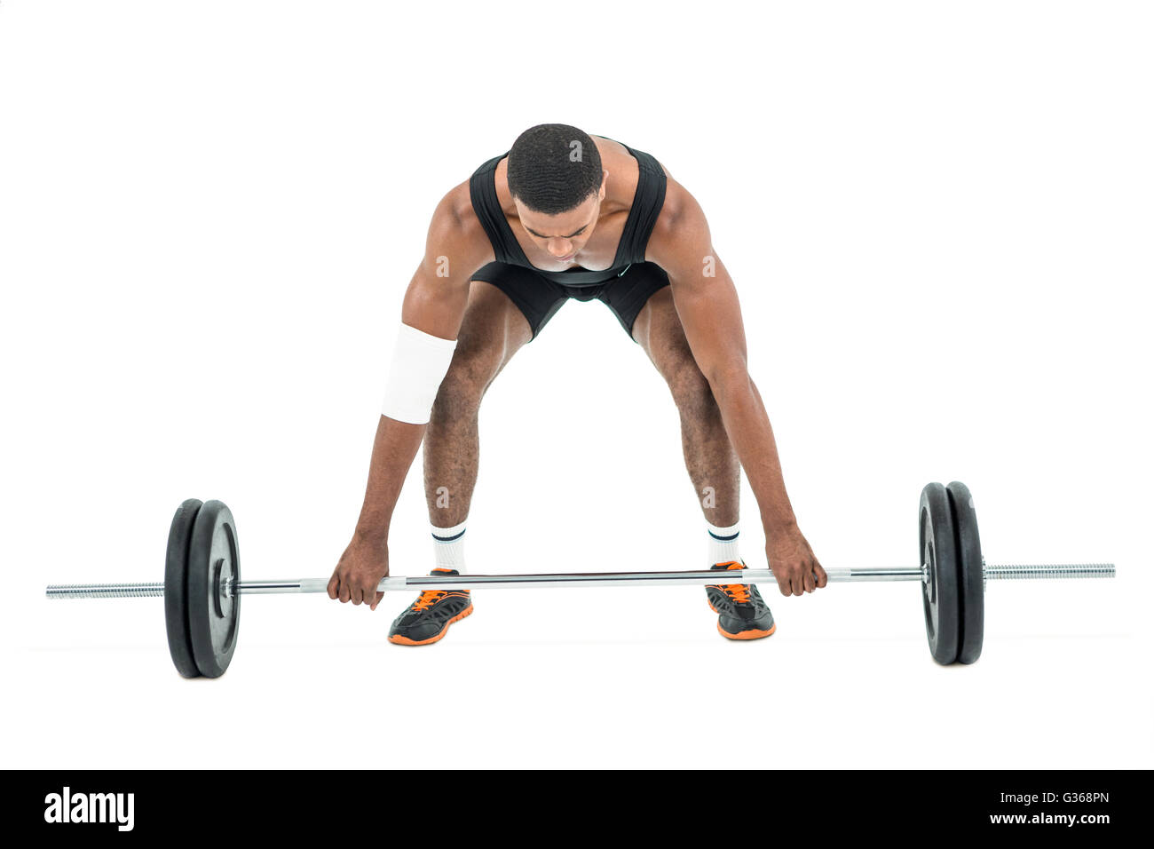 Bodybuilder lifting heavy barbell weights Stock Photo