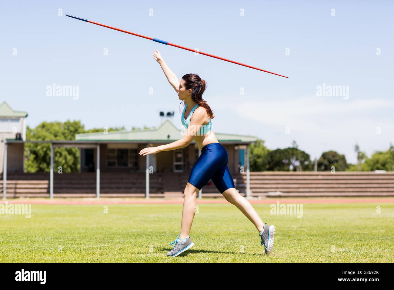 Female athlete throwing a javelin Stock Photo Alamy